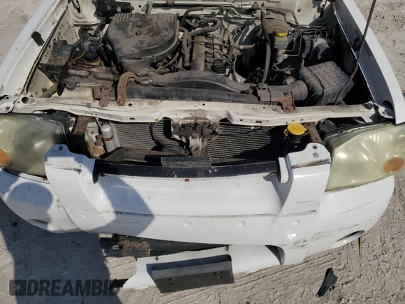 2004 Nissan Frontier XE with VIN 1N6DD26T04C450297, listed as a Copart auction lot 47326415 with 220,266 mi miles and Salvage title. Bid and sale history available at DreamBid. Image 12.