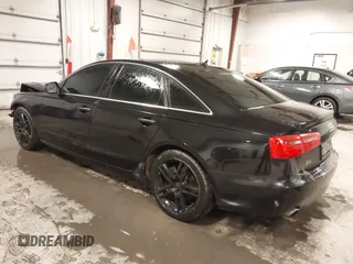 2015 Audi A6 2.0T Premium Plus with VIN WAUGFAFC7FN012983, listed as a IAAI auction lot 41086404 with 145,358 mi miles. Bid and sale history available at carsss.com. Image 3.