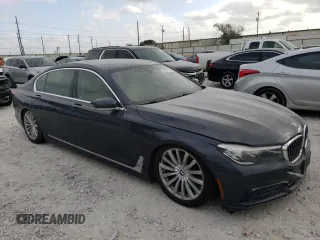 2017 BMW 7 Series 740i xDrive with VIN WBA7E4C5XHGU99064, listed as a Copart auction lot 70792133 with 122,264 mi miles. Bid and sale history available at carsss.com. Image 4.