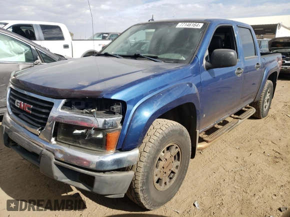2006 GMC Canyon SLE2 with VIN 1GTDT136968311810, listed as a Copart auction lot 77146164 with 243,109 mi miles and Salvage Title. Bid and sale history available at carsss.com. Image 1.