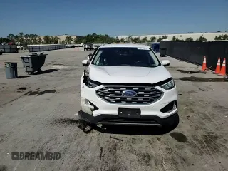 2020 Ford Edge SEL z VIN 2FMPK4J90LBA28943, wystawiony jako Copart lot #52723915 z przebiegiem 194 759 mil mil oraz Szkoda całkowita • Salvage title. Historia ofert i sprzedaży dostępna na DreamBid. Obrazek 14.