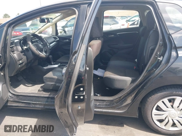 2015 Honda Fit LX z VIN 3HGGK5H52FM765921, wystawiony jako IAAI lot #42135740 z przebiegiem 82 647 mil mil oraz . Historia ofert i sprzedaży dostępna na DreamBid. Obrazek 8.