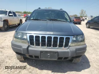2003 Jeep Grand Cherokee Laredo with VIN 1J4GX48S83C504543, listed as a Copart auction lot 52723835 with 220,574 mi miles and Clean Title. Bid and sale history available at carsss.com. Image 5.