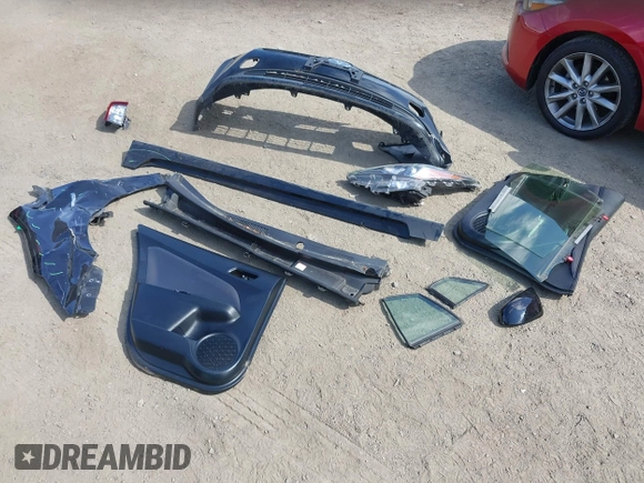 2021 Toyota Prius L Eco with VIN JTDKAMFU3M3140233, listed as a IAAI auction lot 42182685 with 38,842 mi miles and . Bid and sale history available at DreamBid. Image 12.