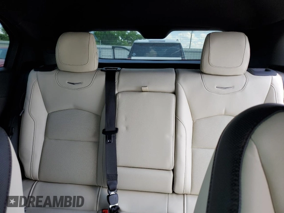 2021 Cadillac XT4 AWD Sport with VIN 1GYFZFR43MF054379, listed as a Copart auction lot 55338315 with 53,693 mi miles and Salvage title. Bid and sale history available at DreamBid. Image 10.
