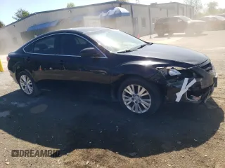 2010 Mazda 6 i Touring Plus with VIN 1YVHZ8CH9A5M02879, listed as a Copart auction lot 54875595 with 144,315 mi miles and Salvage title. Bid and sale history available at DreamBid. Image 4.