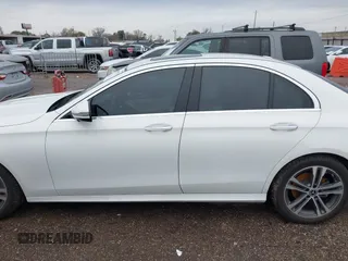 2021 Mercedes-Benz E-Class E 350 with VIN W1KZF8DB8MA897753, listed as a IAAI auction lot 41335129 with 76,873 mi miles. Bid and sale history available at carsss.com. Image 15.
