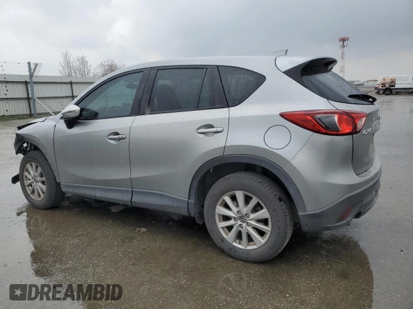 2015 Mazda CX-5 Touring with VIN JM3KE2CY4F0469096, listed as a Copart auction lot 48075105 with 131,788 mi miles and Salvage Title. Bid and sale history available at carsss.com. Image 2.