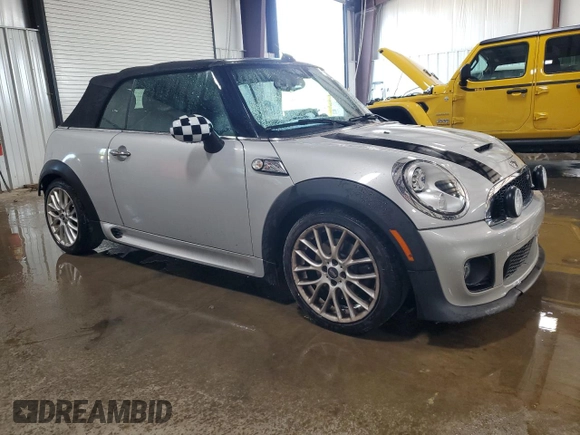 2013 MINI Convertible S z VIN WMWZP3C50DT550943, wystawiony jako Copart lot #62070255 z przebiegiem 63 122 mil mil oraz Szkoda całkowita • Salvage title. Historia ofert i sprzedaży dostępna na DreamBid. Obrazek 4.
