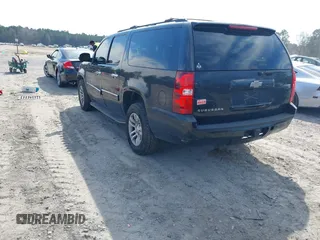 2013 Chevrolet Suburban LT with VIN 1GNSCJE07DR147780, listed as a IAAI auction lot 41666746 with 260,020 mi miles and . Bid and sale history available at DreamBid. Image 3.