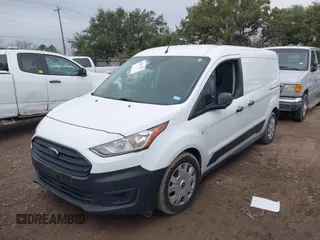 2019 Ford Transit Connect XL z VIN NM0LE7E27K1431057, wystawiony jako IAAI lot #41309282 z przebiegiem 75 564 mil mil oraz . Historia ofert i sprzedaży dostępna na DreamBid. Obrazek 17.