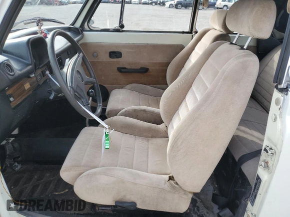 1976 Volkswagen Beetle with VIN 1562109448, listed as a Copart auction lot 48536135 with 10,295 mi miles and Salvage Title. Bid and sale history available at DreamBid. Image 7.