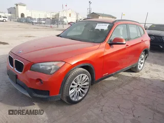 2014 BMW X1 sDrive28i with VIN WBAVM1C50EVW53376, listed as a IAAI auction lot 41838580 with 114,054 mi miles. Bid and sale history available at carsss.com. Image 2.