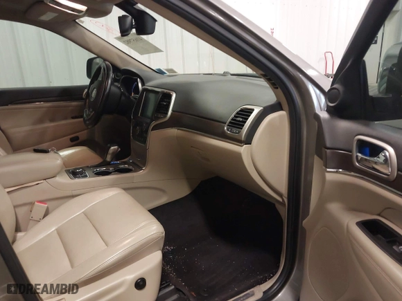 2016 Jeep Grand Cherokee Limited 75th Anniversary with VIN 1C4RJFBG6GC453307, listed as a IAAI auction lot 41657982 with 141,647 mi miles. Bid and sale history available at carsss.com. Image 5.