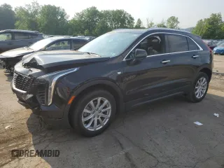 2022 Cadillac XT4 AWD Luxury with VIN 1GYFZBR45NF164036, listed as a Copart auction lot 58950615 with 32,693 mi miles and Salvage title. Bid and sale history available at DreamBid. Image 1.
