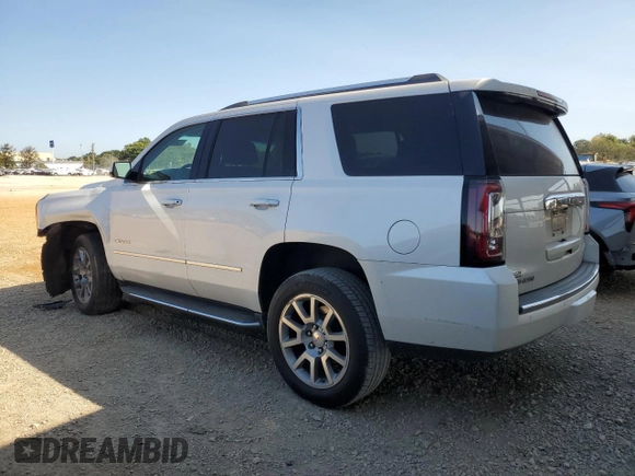 2020 GMC Yukon Denali with VIN 1GKS1CKJ6LR170901, listed as a Copart auction lot 76034594 with 118,738 mi miles and Salvage Title. Bid and sale history available at carsss.com. Image 2.
