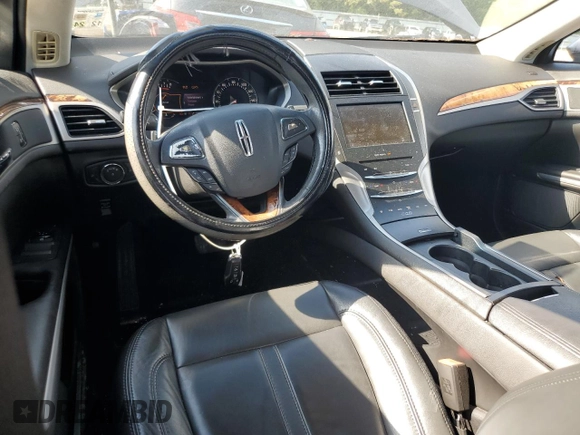 2013 Lincoln MKZ z VIN 3LN6L2G99DR803487, wystawiony jako Copart lot #58232125 z przebiegiem 123 005 mil mil oraz Szkoda całkowita • Salvage title. Historia ofert i sprzedaży dostępna na DreamBid. Obrazek 8.