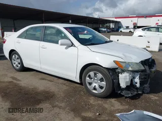 2009 Toyota Camry with VIN 4T1BE46K69U913065, listed as a IAAI auction lot 41906304 with 153,018 mi miles. Bid and sale history available at carsss.com. Image 1.