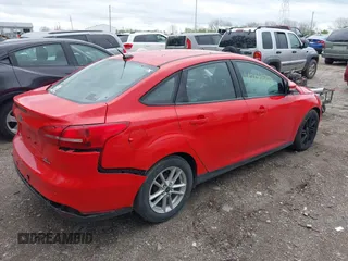 2016 Ford Focus SE z VIN 1FADP3F23GL285640, wystawiony jako IAAI lot #42066370 z przebiegiem 97 007 mil mil oraz . Historia ofert i sprzedaży dostępna na DreamBid. Obrazek 4.