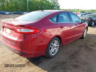2014 Ford Fusion SE with VIN 1FA6P0HD0E5406115, listed as a IAAI auction lot 42137818 with 152,540 mi miles. Bid and sale history available at carsss.com. Image 4.