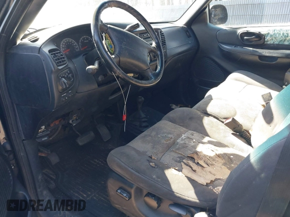 2003 Ford F-150 XL with VIN 1FTRX18L93NA46053, listed as a IAAI auction lot 42003621 with 237,000 mi miles. Bid and sale history available at carsss.com. Image 5.