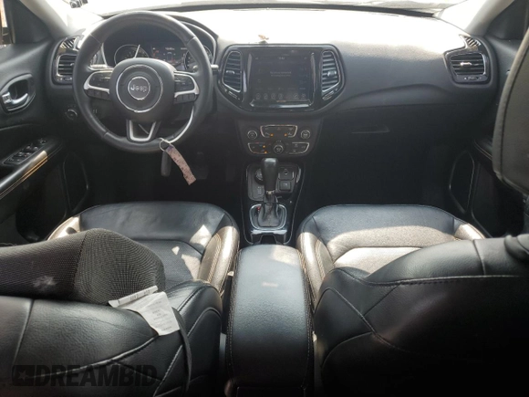 2018 Jeep Compass Limited z VIN 3C4NJDCB5JT341499, wystawiony jako Copart lot #59338715 z przebiegiem 131 149 mil mil oraz Szkoda całkowita • Salvage title. Historia ofert i sprzedaży dostępna na DreamBid. Obrazek 8.