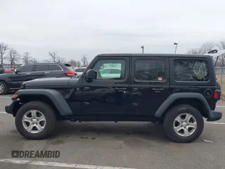 2022 Jeep Wrangler Unlimited Willys Sport with VIN 1C4HJXDN3NW132771, listed as a IAAI auction lot 41052274 with 33,302 mi miles and . Bid and sale history available at DreamBid. Image 14.