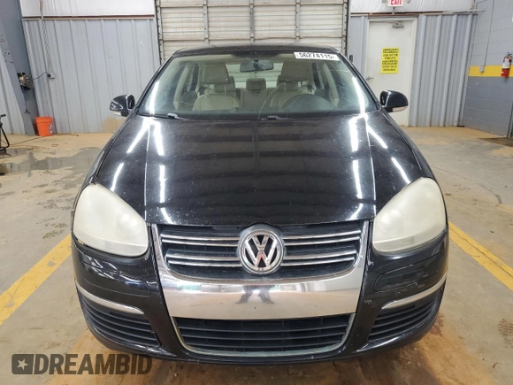 2010 Volkswagen Jetta Limited Edition with VIN 3VWAX7AJ4AM162032, listed as a Copart auction lot 56274115 with 164,642 mi miles and Salvage title. Bid and sale history available at DreamBid. Image 5.