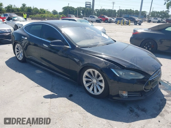 2014 Tesla Model S P85D with VIN 5YJSA1H25EFP65571, listed as a IAAI auction lot 42185442 with 115,990 mi miles and . Bid and sale history available at DreamBid. Image 1.