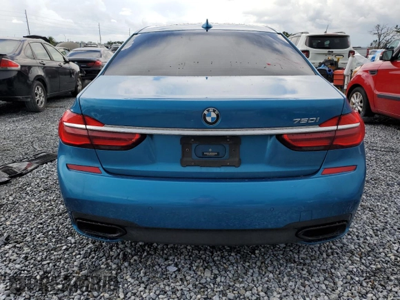 2019 BMW 7 Series 750i z VIN WBA7F0C51KGM25707, wystawiony jako Copart lot #61950495 z przebiegiem 56 768 mil mil oraz Nie do naprawy • Non repairable. Historia ofert i sprzedaży dostępna na DreamBid. Obrazek 6.