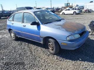 1995 Ford Aspire z VIN KNJLT06H7S6105536, wystawiony jako IAAI lot #41860978 z przebiegiem 66 132 mil mil oraz . Historia ofert i sprzedaży dostępna na DreamBid. Obrazek 1.