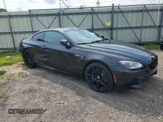 2014 BMW M6 z VIN WBSLX9C54ED160430, wystawiony jako Copart lot #66270794 z przebiegiem 92 025 mil mil oraz Szkoda całkowita • Salvage title. Historia ofert i sprzedaży dostępna na DreamBid. Obrazek 4.