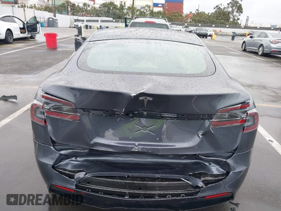 2022 Tesla Model S with VIN 5YJSA1E52NF459460, listed as a IAAI auction lot 41736236 with Not Provided miles and . Bid and sale history available at DreamBid. Image 16.