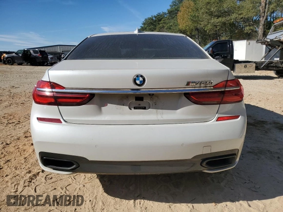 2016 BMW 7 Series 750i with VIN WBA7F0C58GGM20723, listed as a Copart auction lot 80143764 with 102,311 mi miles and Salvage Title. Bid and sale history available at carsss.com. Image 6.