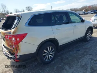 2019 Honda Pilot EX-L with VIN 5FNYF6H51KB052648, listed as a IAAI auction lot 41928269 with 67,878 mi miles and . Bid and sale history available at carsss.com. Image 4.
