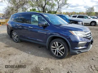 2017 Honda Pilot Touring with VIN 5FNYF6H94HB048329, listed as a Copart auction lot 53202735 with 140,453 mi miles and Salvage Title. Bid and sale history available at carsss.com. Image 4.