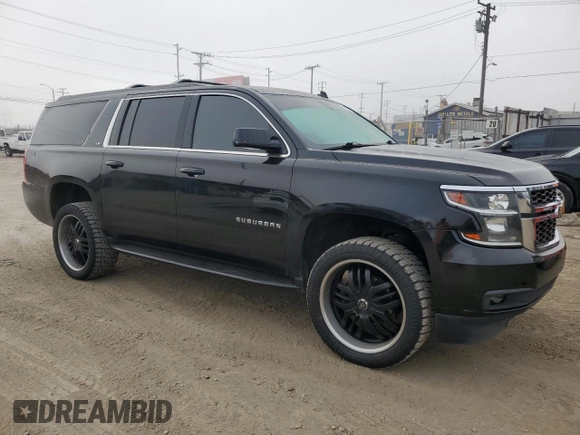 2015 Chevrolet Suburban LS z VIN 1GNSCHKC5FR250108, wystawiony jako Copart lot #47133585 z przebiegiem 188 099 mil mil oraz Czysty tytuł • Clean title. Historia ofert i sprzedaży dostępna na DreamBid. Obrazek 4.