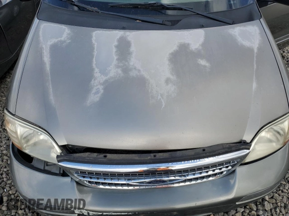 2000 Ford Windstar SE с VIN 2FMZA5249YBC34841, выставлен на аукционе Copart как лот 72383304 с пробегом Не указан миль и Списание • Salvage title. История ставок и продаж доступна на DreamBid. Изображение 12.