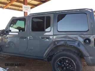 2021 Jeep Wrangler Unlimited Sport S with VIN 1C4HJXDG5MW695014, listed as a IAAI auction lot 41692838 with 66,247 mi miles and . Bid and sale history available at DreamBid. Image 14.