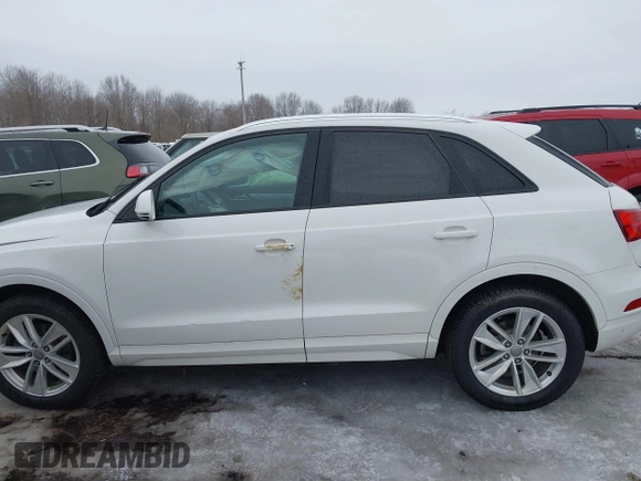 2017 Audi Q3 Premium z VIN WA1BCCFS4HR016424, wystawiony jako IAAI lot #41627278 z przebiegiem 60 028 mil mil oraz . Historia ofert i sprzedaży dostępna na DreamBid. Obrazek 14.