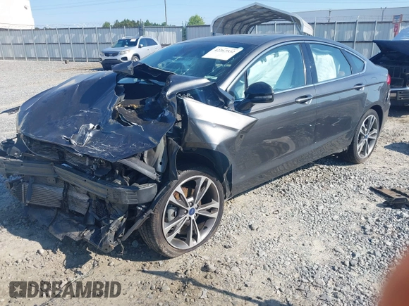 2020 Ford Fusion Titanium with VIN 3FA6P0K91LR175109, listed as a IAAI auction lot 42267532 with 75,000 mi miles and . Bid and sale history available at DreamBid. Image 17.