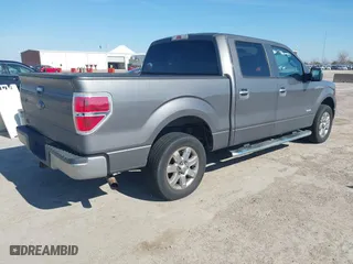 2013 Ford F-150 XL with VIN 1FTFW1CT2DKE96952, listed as a IAAI auction lot 41592253 with 160,119 mi miles. Bid and sale history available at carsss.com. Image 4.