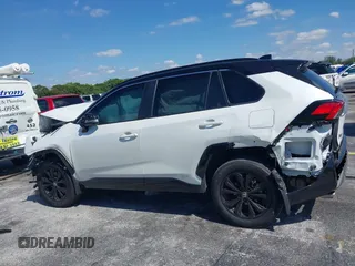 2024 Toyota RAV4 Hybrid XSE with VIN 2T3E6RFV9RW077941, listed as a IAAI auction lot 42012134 with 31,009 mi miles and . Bid and sale history available at DreamBid. Image 14.