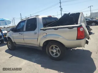 2004 Ford Explorer Sport Trac XLS with VIN 1FMZU67K34UB93390, listed as a Copart auction lot 53912075 with 220,520 mi miles and Salvage Title. Bid and sale history available at carsss.com. Image 2.