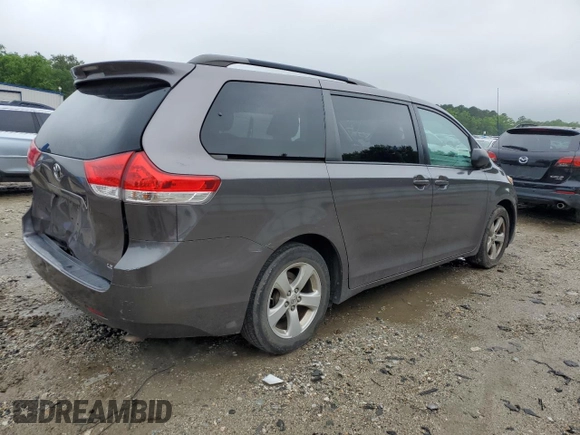 2013 Toyota Sienna LE AAS with VIN 5TDKK3DC3DS305228, listed as a Copart auction lot 57238075 with 204,001 mi miles and Salvage title. Bid and sale history available at DreamBid. Image 3.