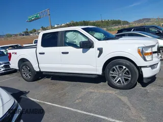 2021 Ford F-150 XL with VIN 1FTEW1CP2MKE42968, listed as a IAAI auction lot 42022454 with 32,908 mi miles. Bid and sale history available at carsss.com. Image 13.