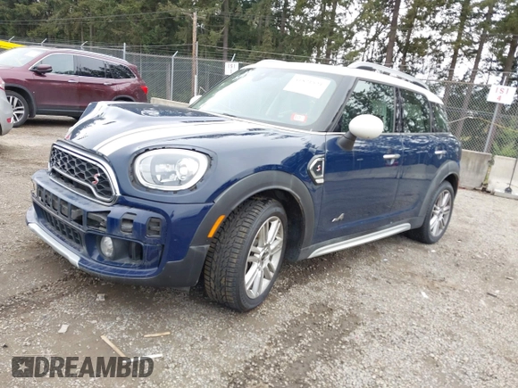 2019 MINI Countryman Cooper S z VIN WMZYT5C54K3G92704, wystawiony jako IAAI lot #41821521 z przebiegiem 95 087 mil mil oraz . Historia ofert i sprzedaży dostępna na DreamBid. Obrazek 2.