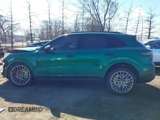 2022 Porsche Cayenne E-Hybrid Hybrid z VIN WP1AE2AY7NDA26826, wystawiony jako IAAI lot #41669548 z przebiegiem 22 644 mil mil oraz . Historia ofert i sprzedaży dostępna na DreamBid. Obrazek 14.