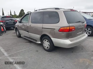 1998 Toyota Sienna LE with VIN 4T3ZF13C4WU047568, listed as a IAAI auction lot 42062449 with 130,019 mi miles. Bid and sale history available at carsss.com. Image 3.