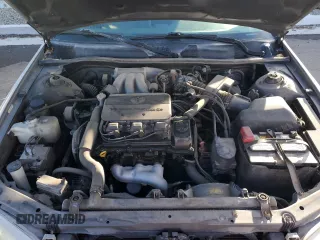1998 Toyota Camry LE z VIN JT2BF28K2W0115564, wystawiony jako Copart lot #46628495 z przebiegiem 133 215 mil mil oraz Czysty tytuł • Clean title. Historia ofert i sprzedaży dostępna na DreamBid. Obrazek 11.